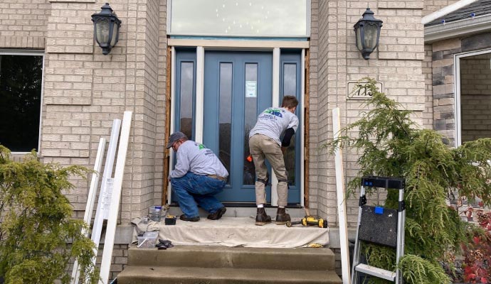 Professional entry door installation by trained technicians in Dallas Texas home
